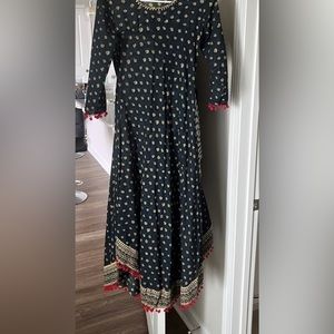 Blue kurta with red tassel